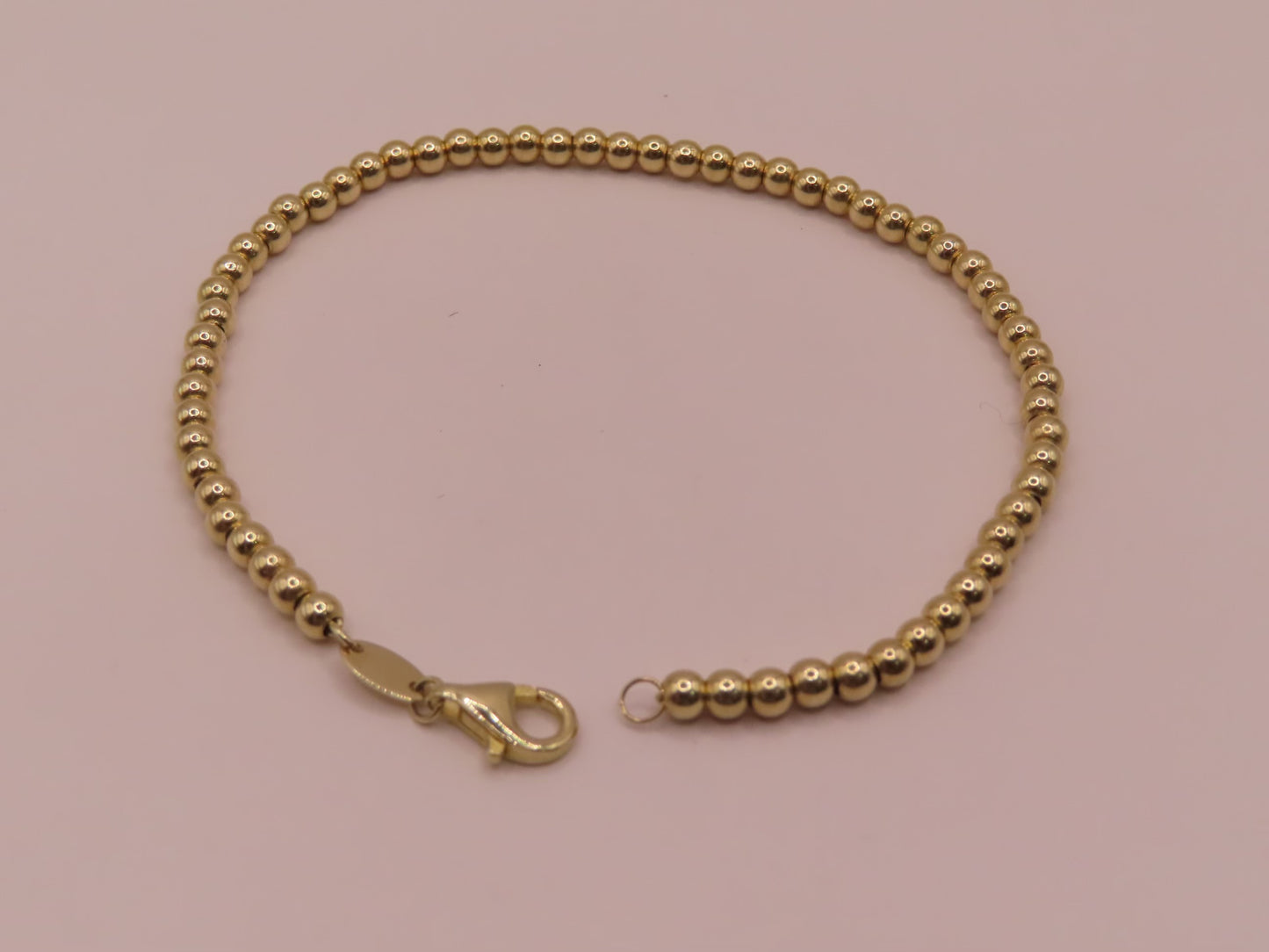10k gold ball bracelet 7in/3mm
