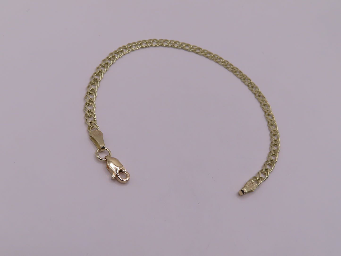 10k gold Rambo bracelet 7in/4mm(3.64g)