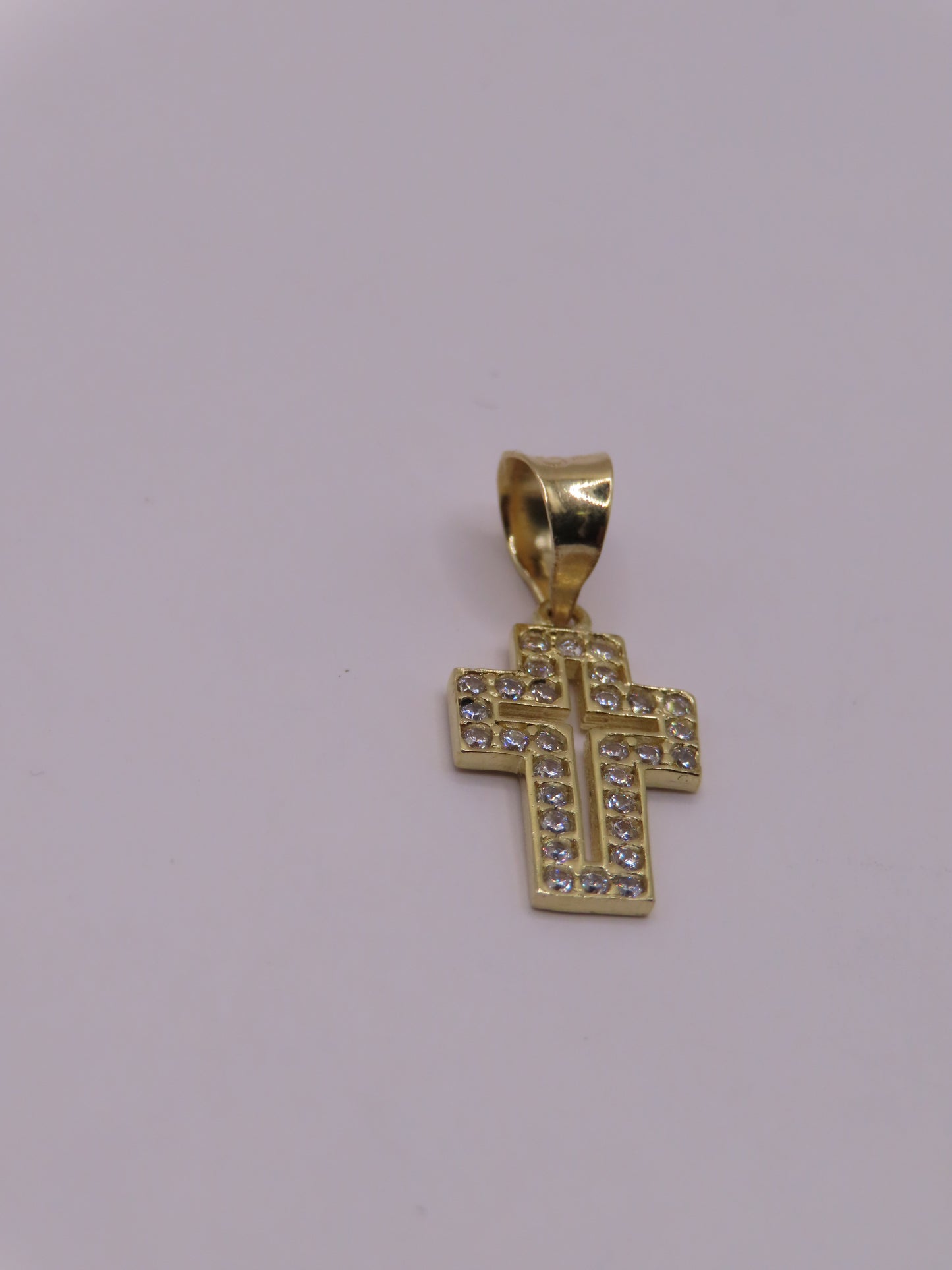 10k Gold mini Cross .8in (1g)
