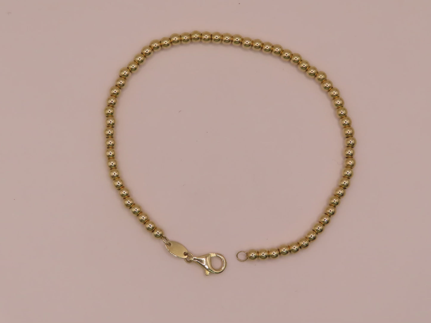 10k gold ball bracelet 7in/3mm