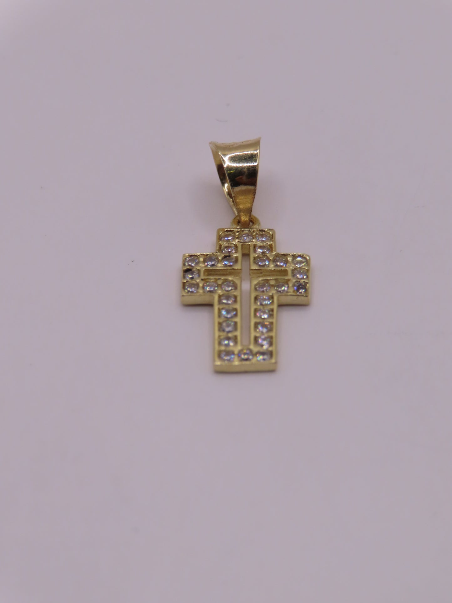 10k Gold mini Cross .8in (1g)