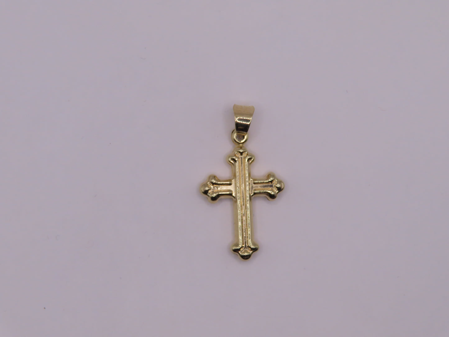 10k Gold cross 1.2in (.83g)