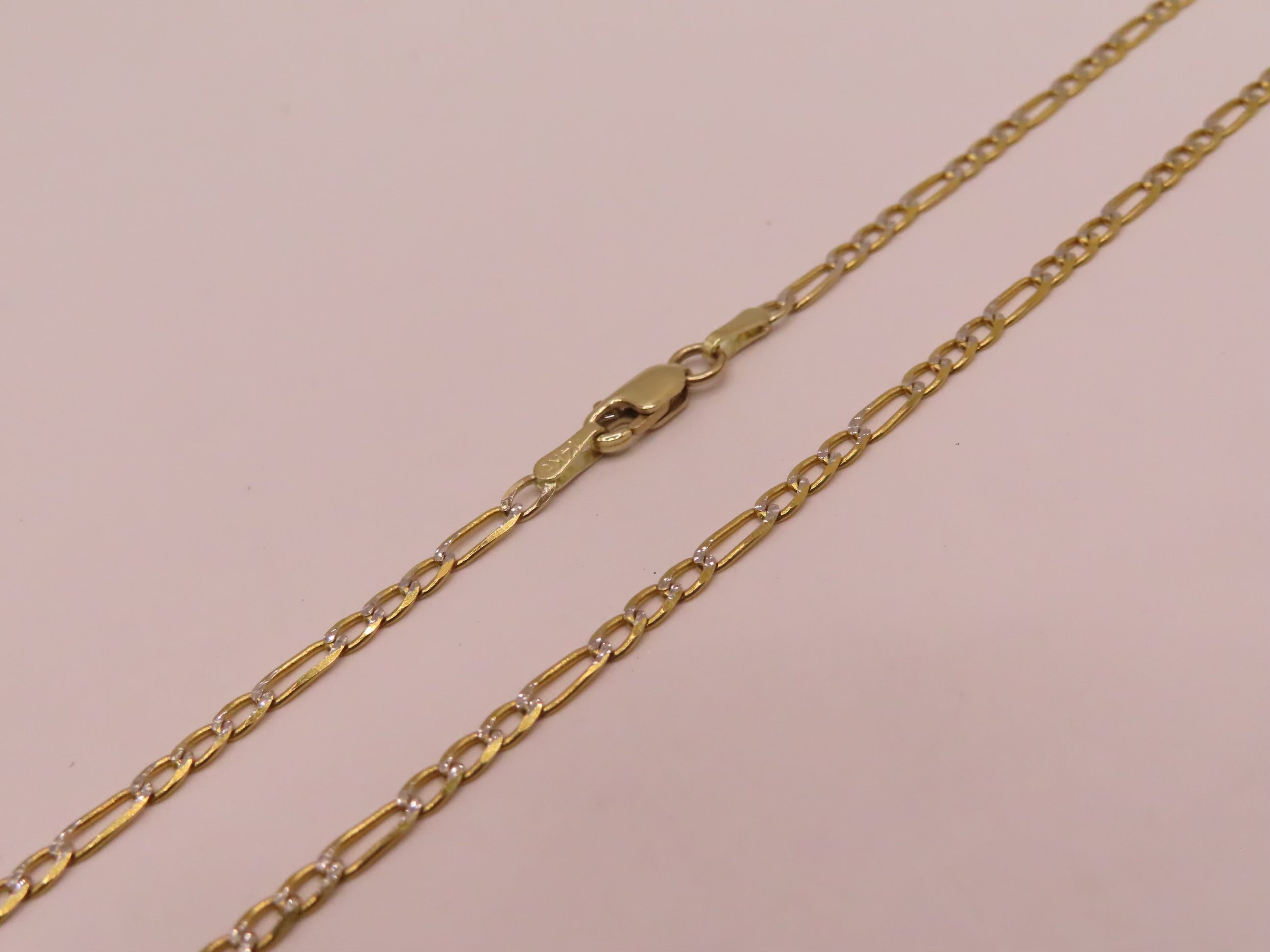 14k Gold diamond cut figaro chain