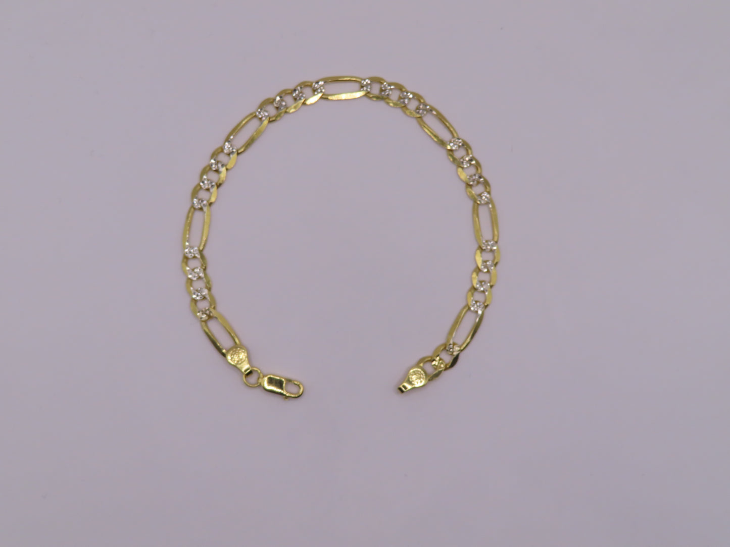 10k Gold Figaro bracelet 8.5in/7mm