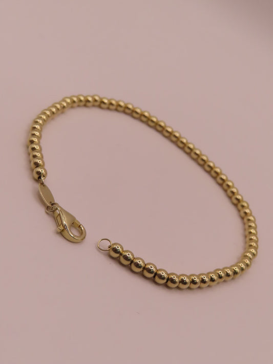 10k gold ball bracelet 7in/3mm