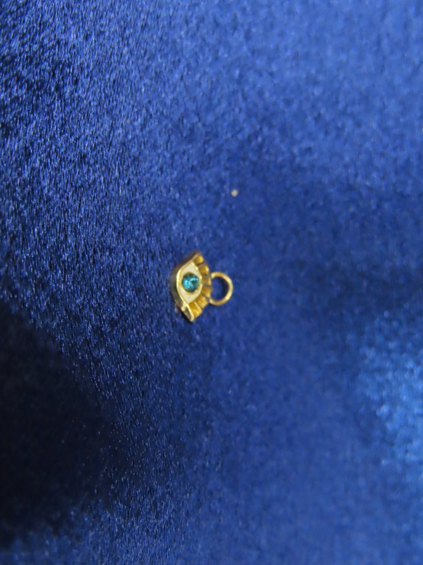 Mini evil eye 10k gold pendant