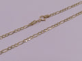 10k gold figaro chain 22in/4mm
