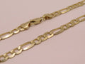14k Gold Figaro solid chain 28in/5mm
