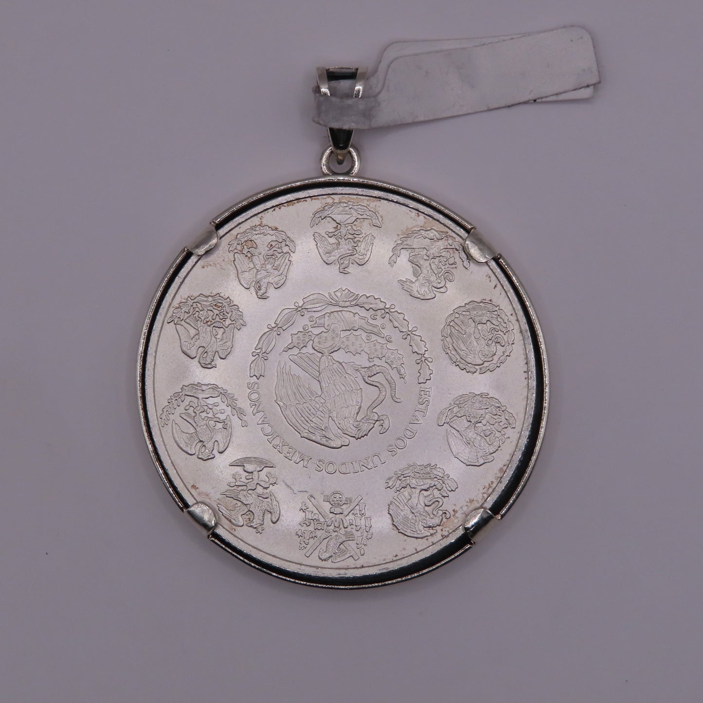 999 silver Centenario 1oz w/925 silver bezel